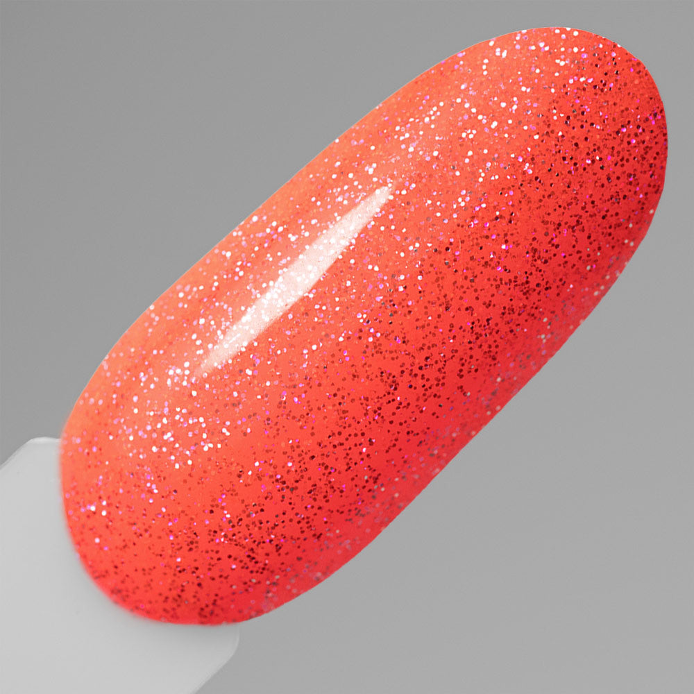 Neonoranssit kynnet flash-glitter-efektillä, kovetettuna kynsiuunissa
