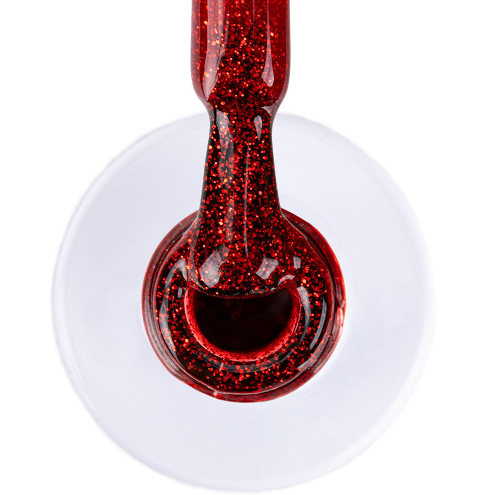 AlleLac Flame 6 g punainen glittergeelilakka siveltimessä, jossa näkyy tiheä punainen kimallus.