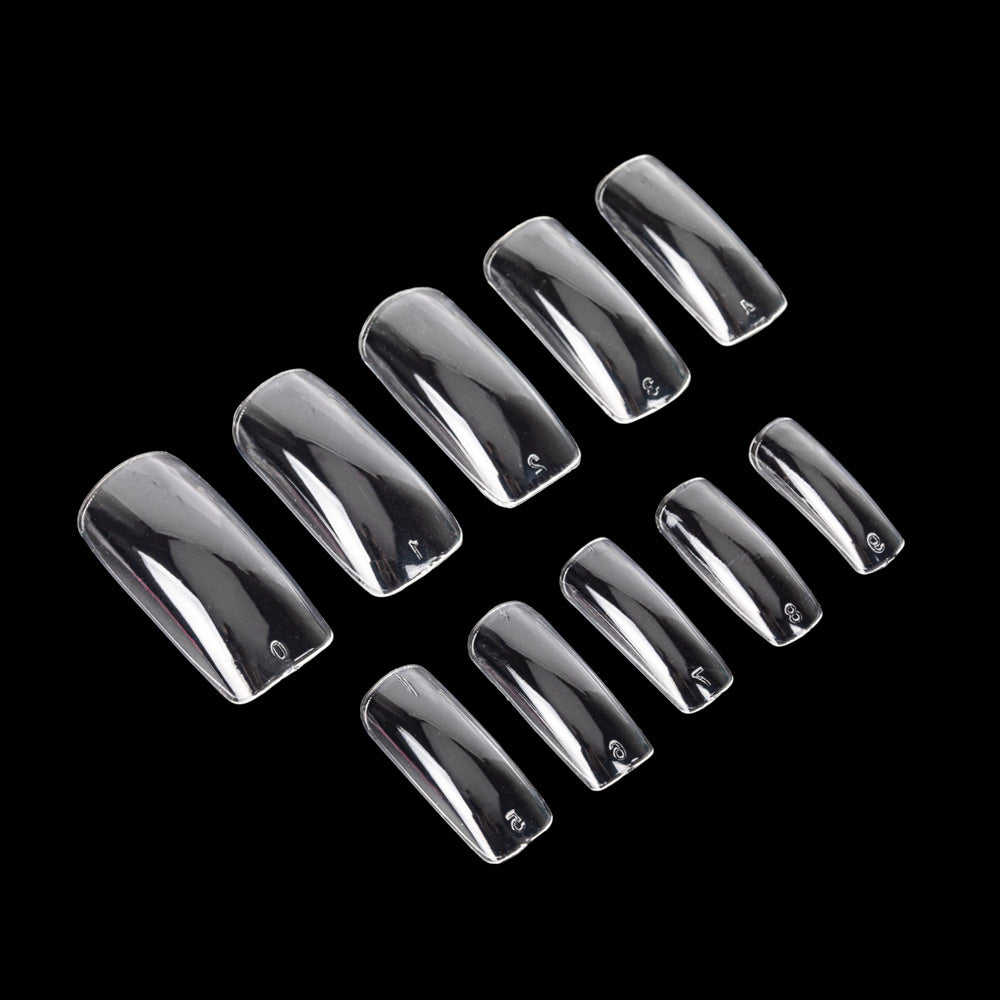 NTN Premium kynsitipit käytössä pidennetyt rakennekynnet valmiina geelilakalla viimeisteltynä eri kokoja