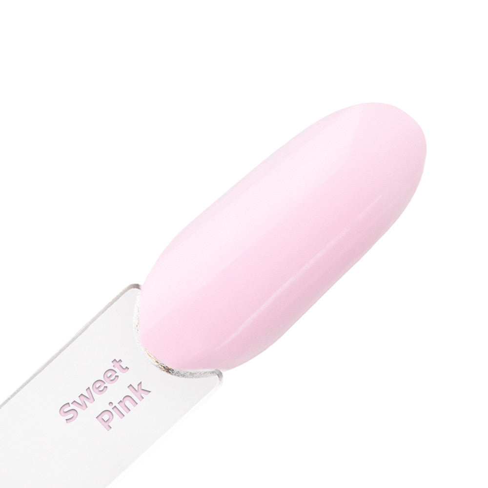 Sweet Pink -rakennegeelin vaaleanpunainen sävy tipillä, paksu ja tasainen koostumus.