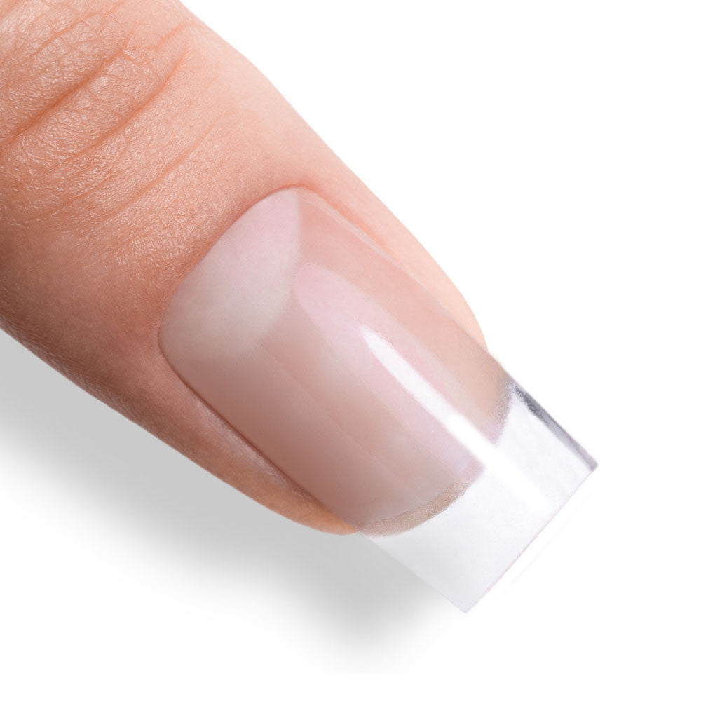 AlleLac Tixo Hard Builder Gel Clear levitetty kirkkaana kerroksena kynnen pinnalle ennen rakenteen muotoilua