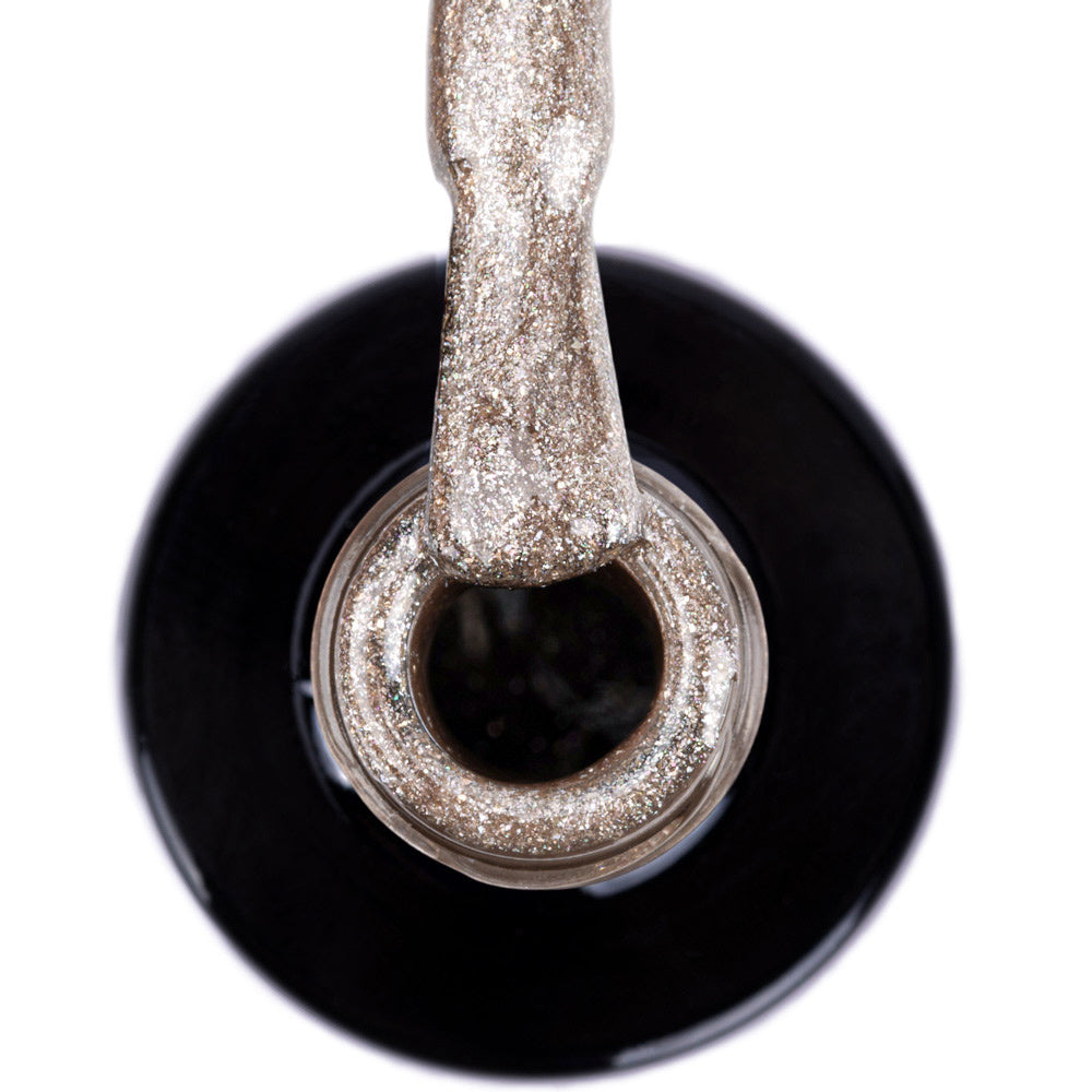 NTN Premium geelilakka 209 siveltimessä, tiheä hopean ja samppanjan sävyinen glitterkoostumus.