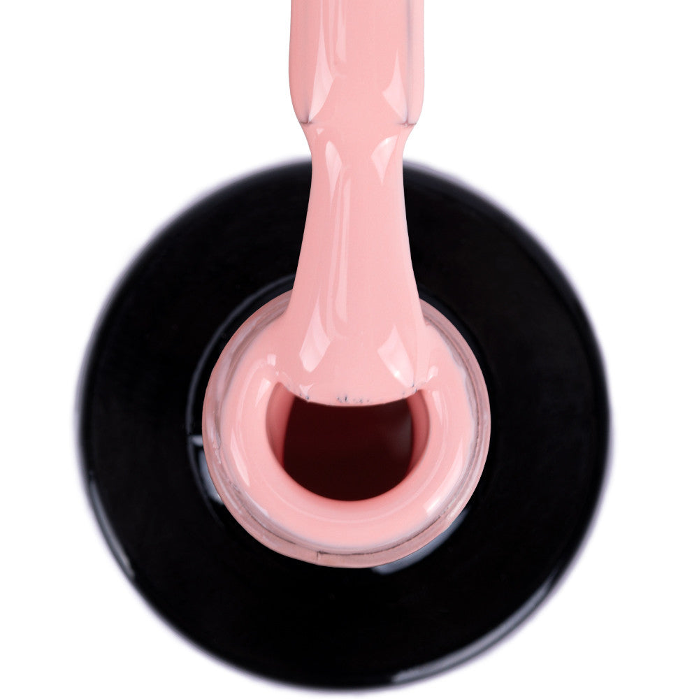 NTN Premium 02 geelilakan vaalea pinkki sävy pullossa, tasainen ja kiiltävä pinta.